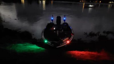 Fishing off a boat at night