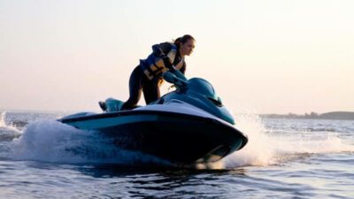 A man and a woman enjoying jet skiing at Nottely Lake in the summer