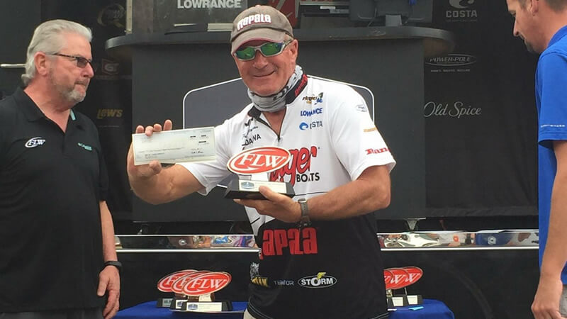 Captain Brad with Check