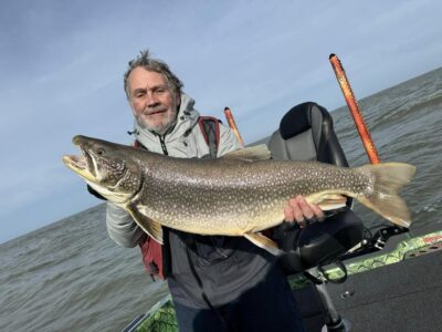 A serene view of Lake Ontario showcasing its vastness and beauty, ideal for fishing