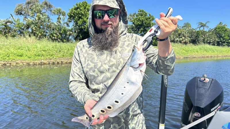 Capt Bill Boliek with Clown Knife Fish